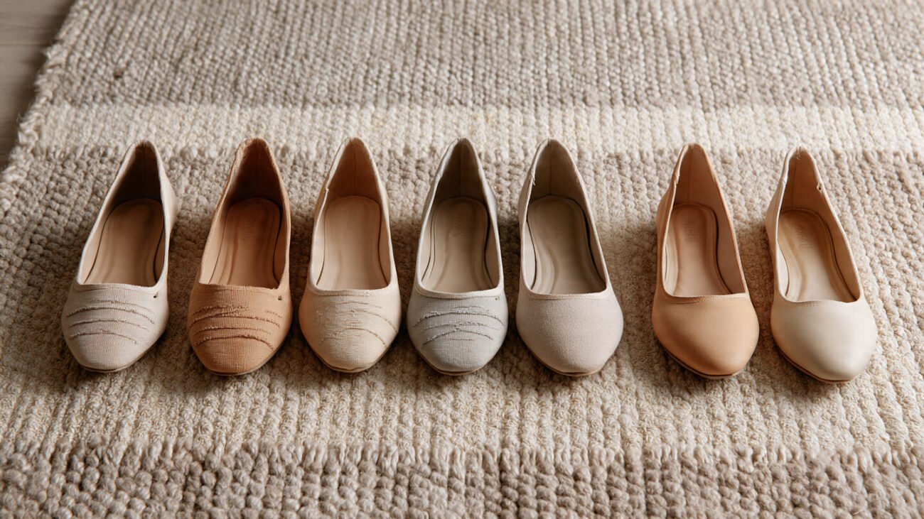 flat shoes lined up in neutral tones